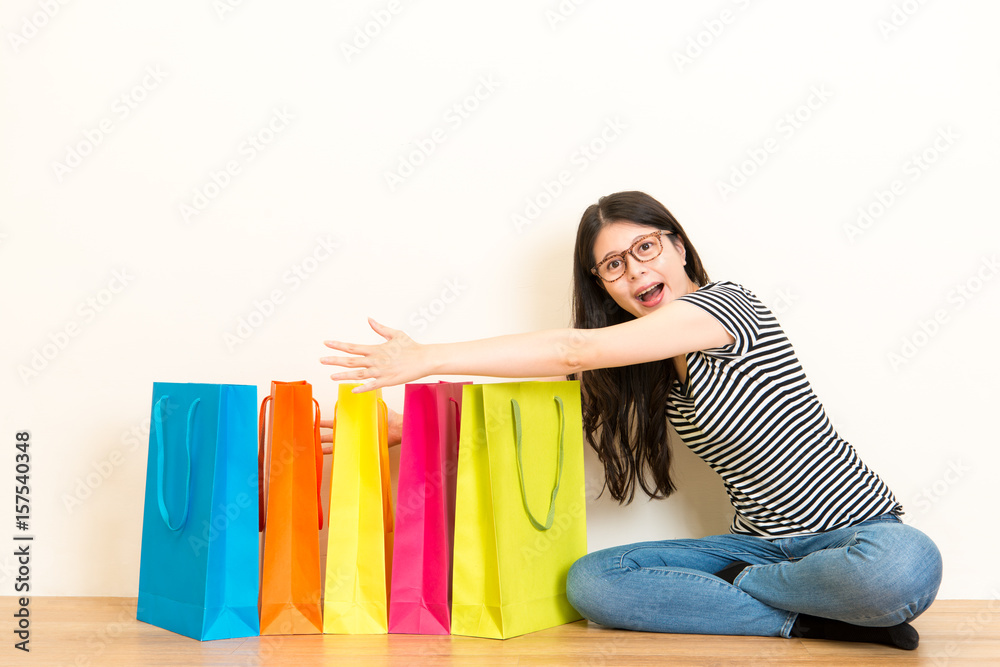 female student showing her birthday shopping bags female student showing her birthday shopping bags