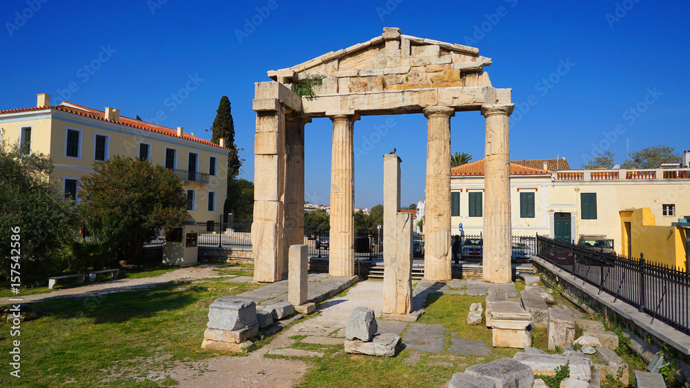 Photo from picturesque Plaka area in center of Athens and Roman Forum archaeological site, Attica, Greece