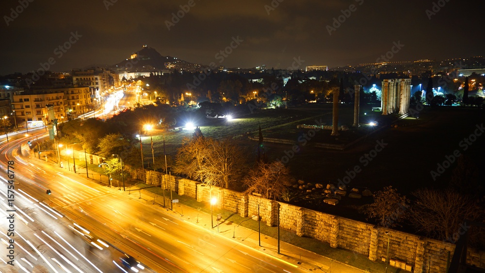 Night photo of Acropolis, Lycabettus and Pillars of Olympian Zeus, Athens historic center, Attica, Greece