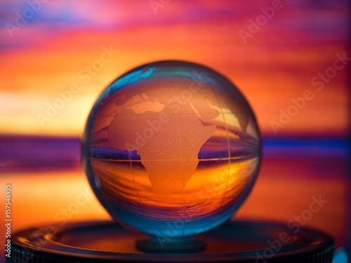Abstract transparent world ball on colorful background © teerawutbunsom