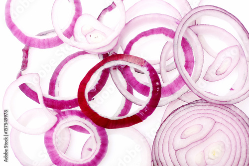 Onion rings and slices in purple colour isolated on white