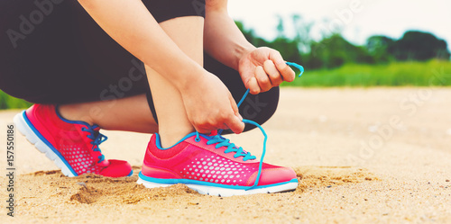 Female runner preparing to jog