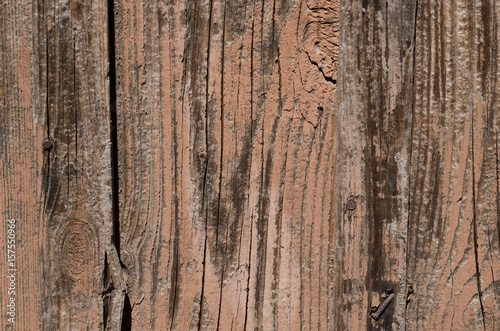 Red color of a wooden texture. Abstract background