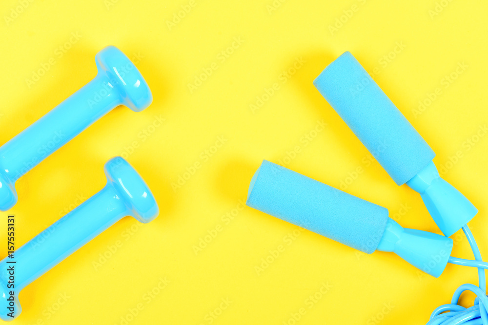 barbell and skipping rope, sport, healthy lifestyle and training concept barbell and skipping rope, sport, healthy lifestyle and training concept
