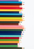 colored pencils in an arrangement on a white background