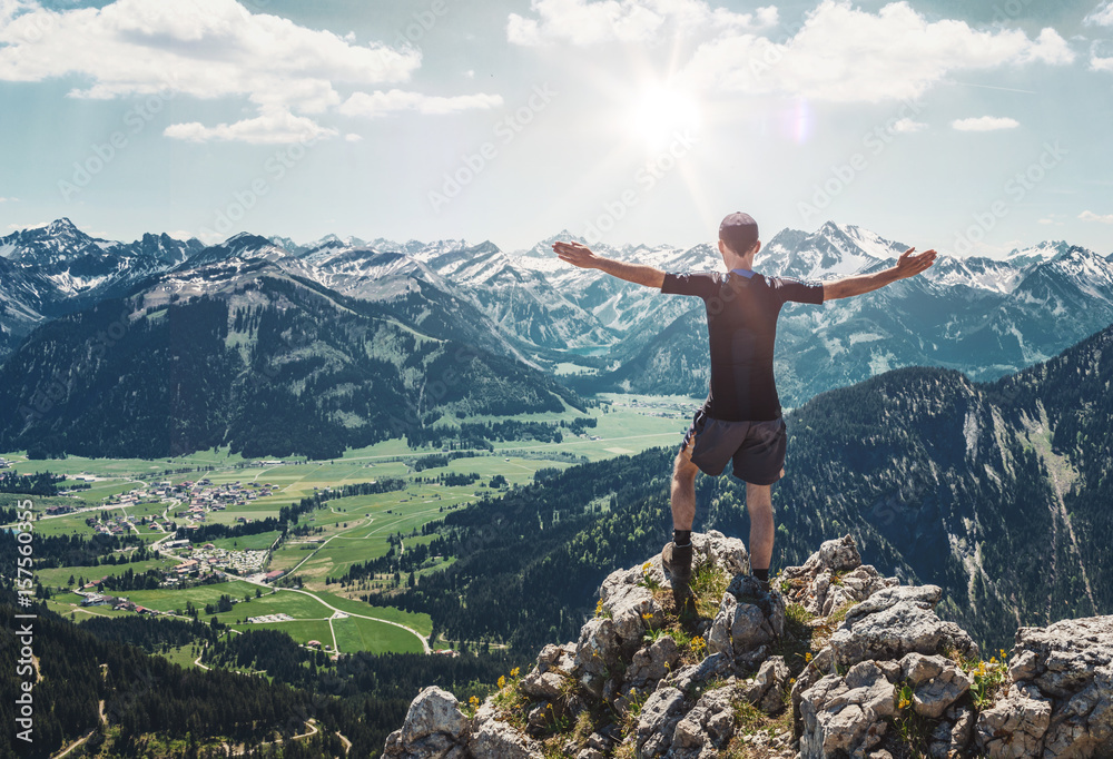 Man Enjoying View of Mountains in Allgau Alps Man Enjoying View of Mountains in Allgau Alps