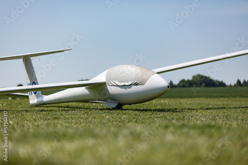 Glider on the grassy airfield.