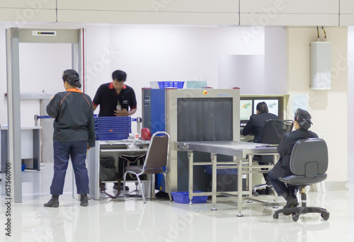 Security gates with metal detectors and scanners at entrance of airport