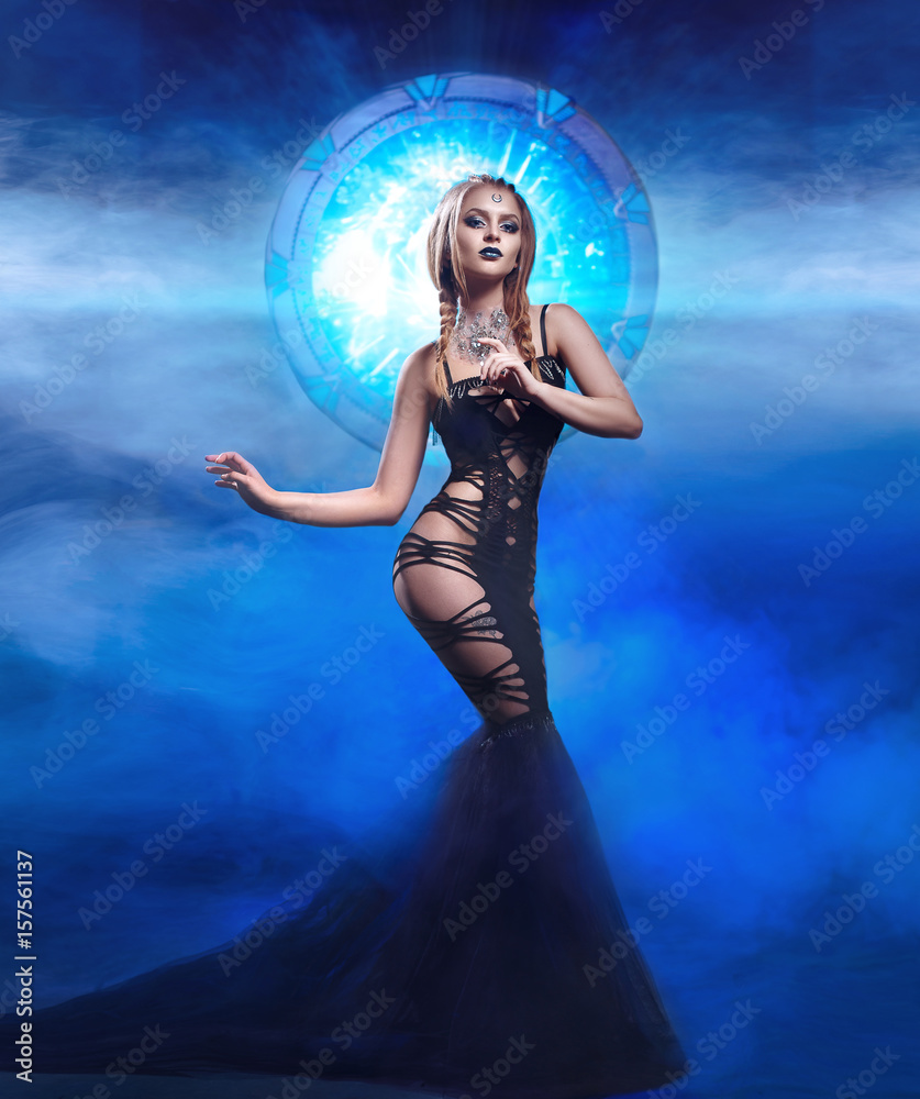  Beautiful guardian of Portals standing in the center of the universe. Space style, hair and artistic make-up. 