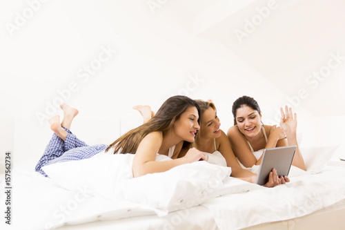 Three pretty young women la...