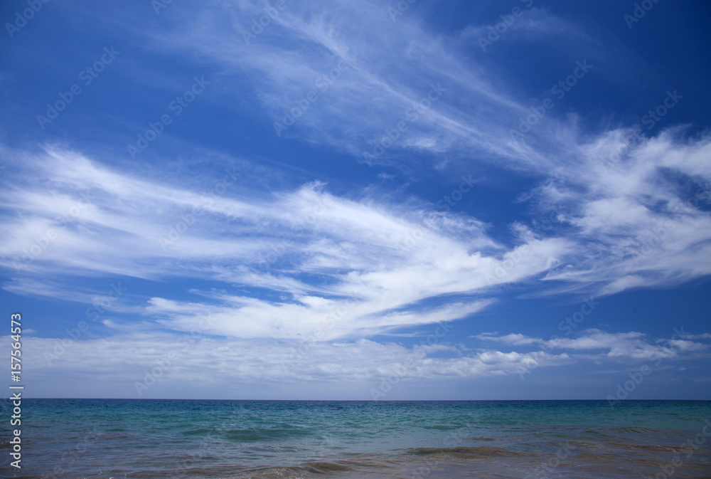 cirrus clouds over ocean