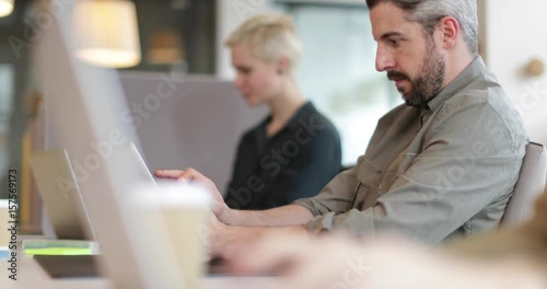 Freelancers working in a shared office space photo