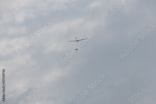 Sailplane pulled up in the air on a winding photo