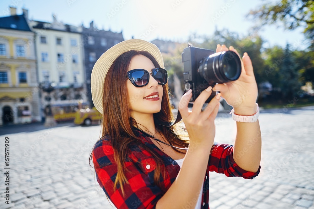 Tourist girl at European city background