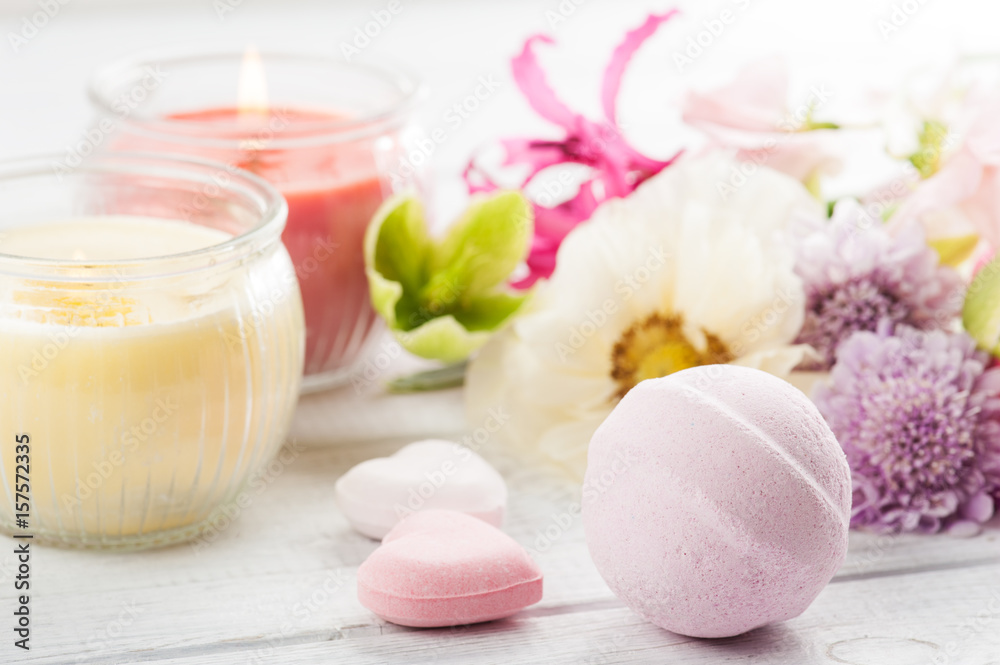 Bath bombs on old wooden background