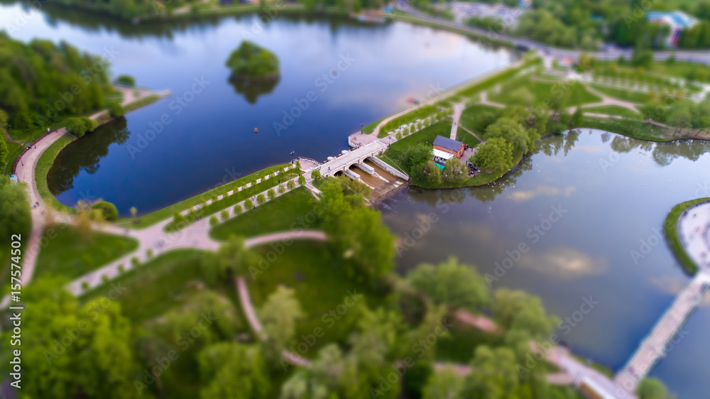 Aerial view of Tsritsyno lake with a dam - Moscow city in Russia. Park. Tilt-shift effect applied. Aerial view of Tsritsyno lake with a dam - Moscow city in Russia. Park. Tilt-shift effect applied.