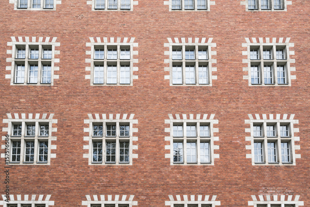 Fototapeta premium facade of an old house with red brick wall