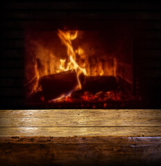 Old wooden table and fireplace