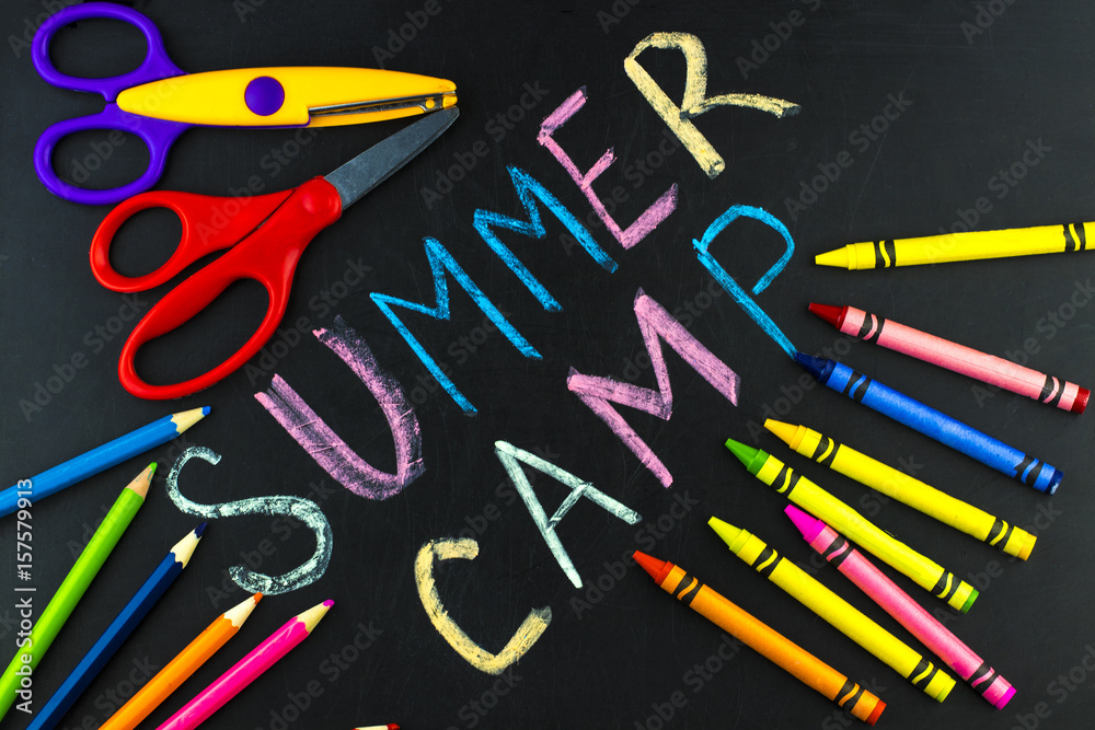 Text Summer camp written with chalk on chalkboard