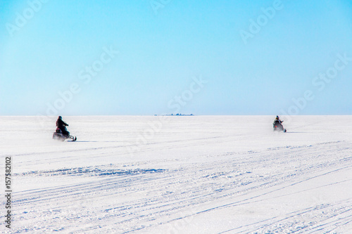 snowmobiles on ice