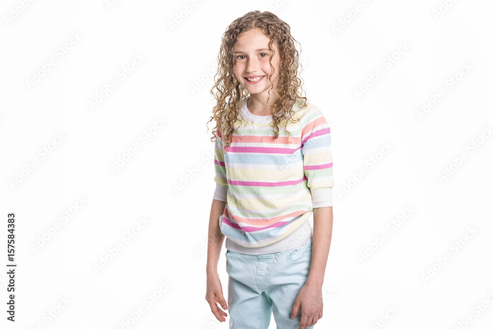 Portrait of happy, smiling, confident 9 years old girl with curly hair, isolated on white Portrait of happy, smiling, confident 9 years old girl with curly hair, isolated on white