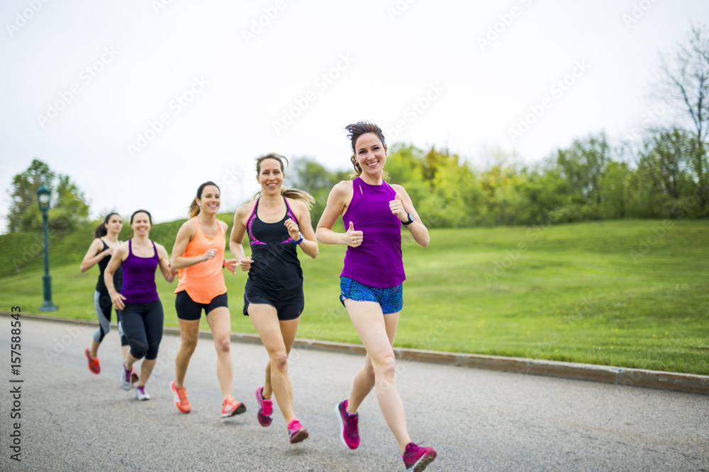 group of people enjoying in the fitness having fun running outside group of people enjoying in the fitness having fun running outside