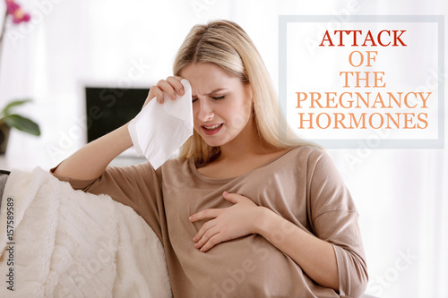 Young pregnant woman suffer...