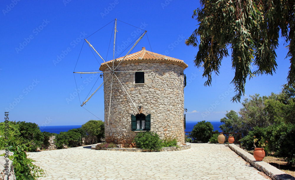 Greek traditional old windmill on Skinari Cape, Zakynthos