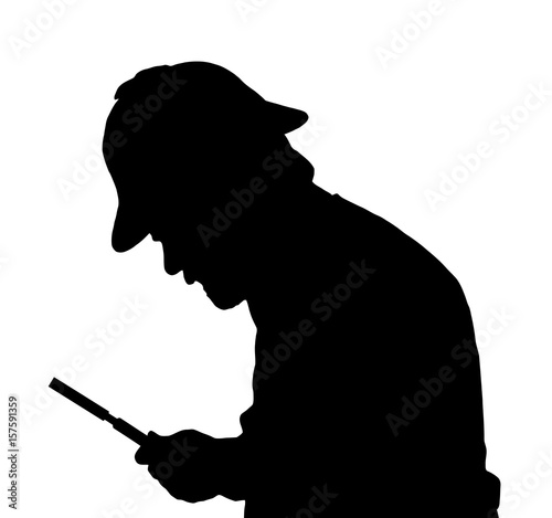 Silhouette of bearded man investigating with a magnifying glass and Sherlock hat
