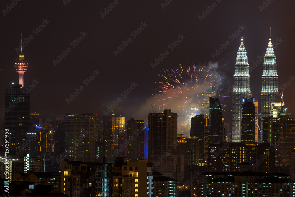 Fireworks explode near Malaysia's landmark Petronas Twin Towers during Independence Day celebrations in Kuala Lumpur.