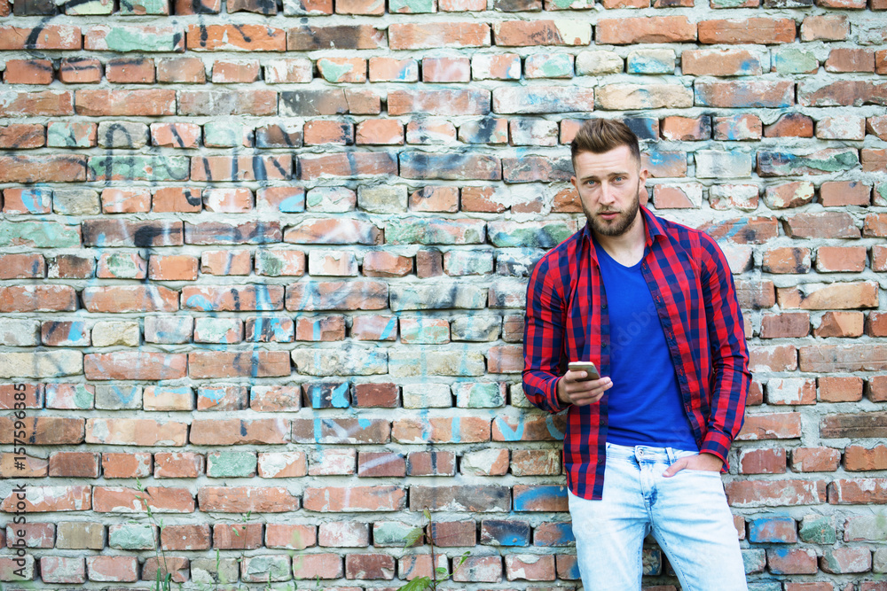 Cute blond bearded guy texting Cute blond bearded guy texting