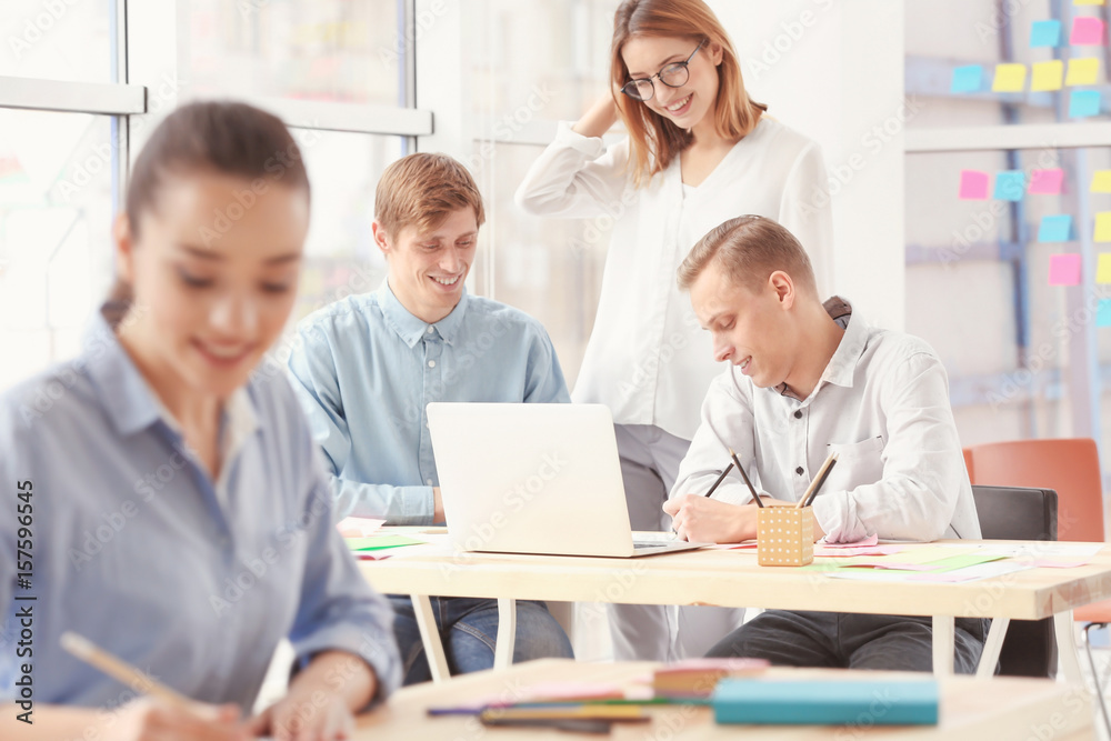 Young people working in office