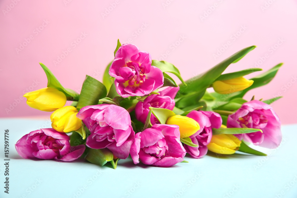 Beautiful tulips on table