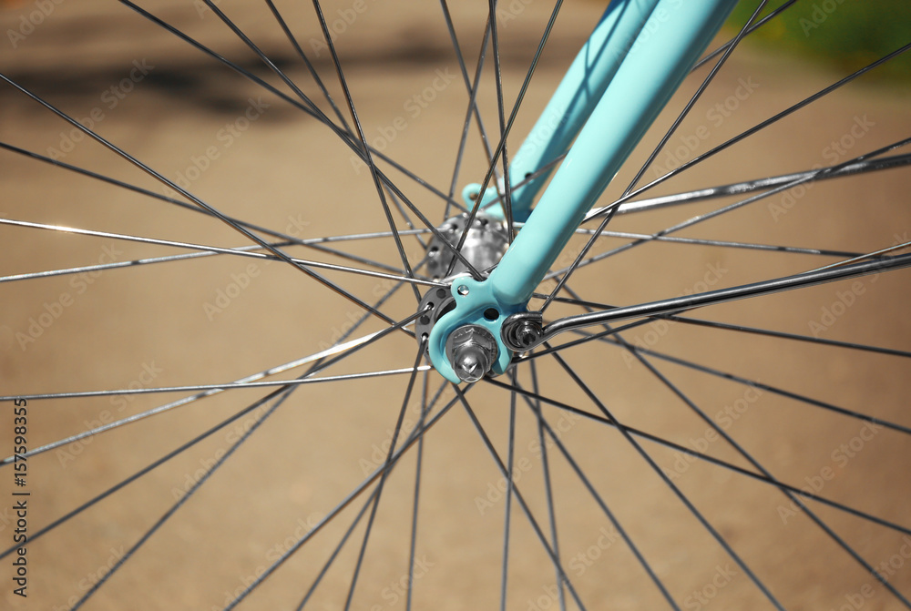 Fototapeta premium Closeup view of bicycle wheel spokes