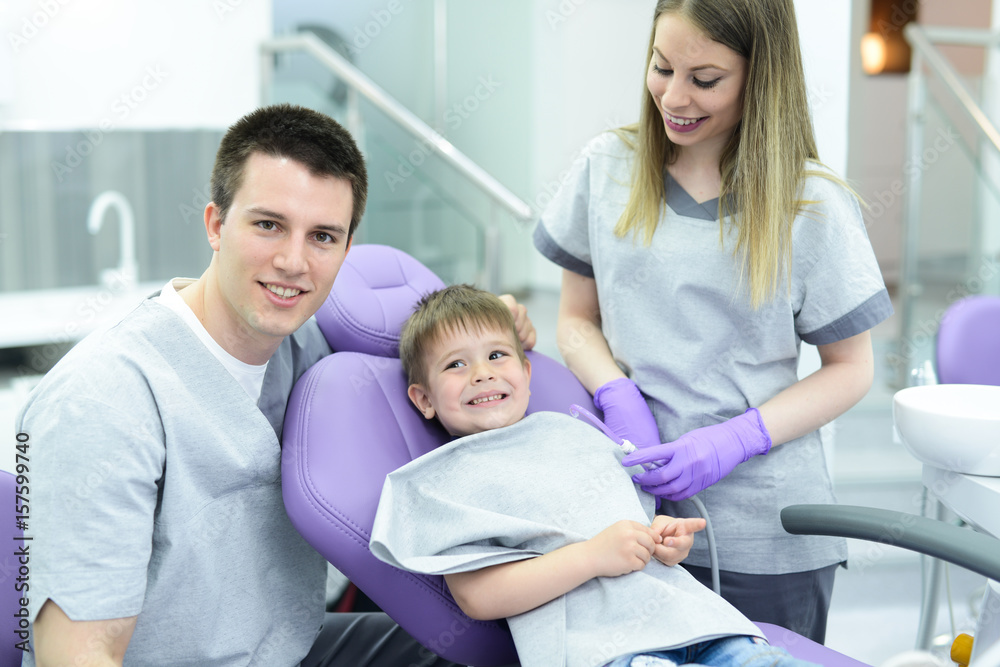 Boy visiting the dentist of for the first time Boy visiting the dentist of for the first time