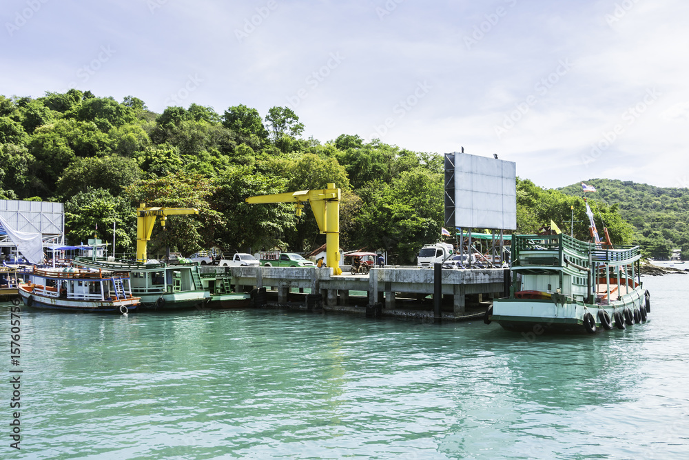 Boat transports tourists at samet island port.