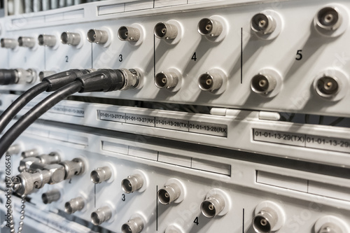 Fotografía Coaxial cable plugged into BNC interface port of communication equipment
