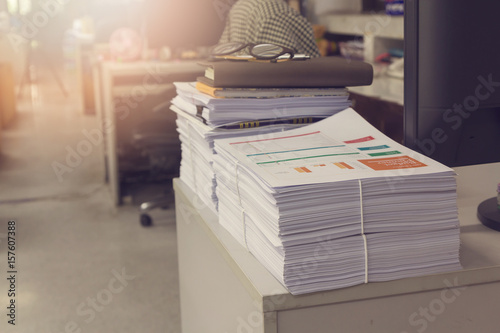 Pile of unfinished documents on office desk, Stack of business paper, Vintage Effect
