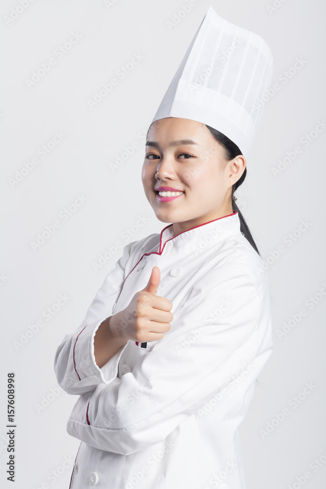 Female chef in front of the background expression Female chef in front of the background expression