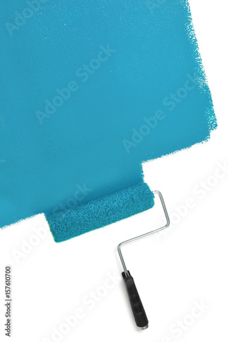 Paint Roller Painting Wall with Blue