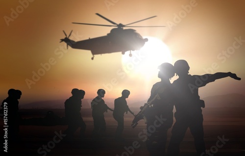 Military helicopter rescue mission at dusk