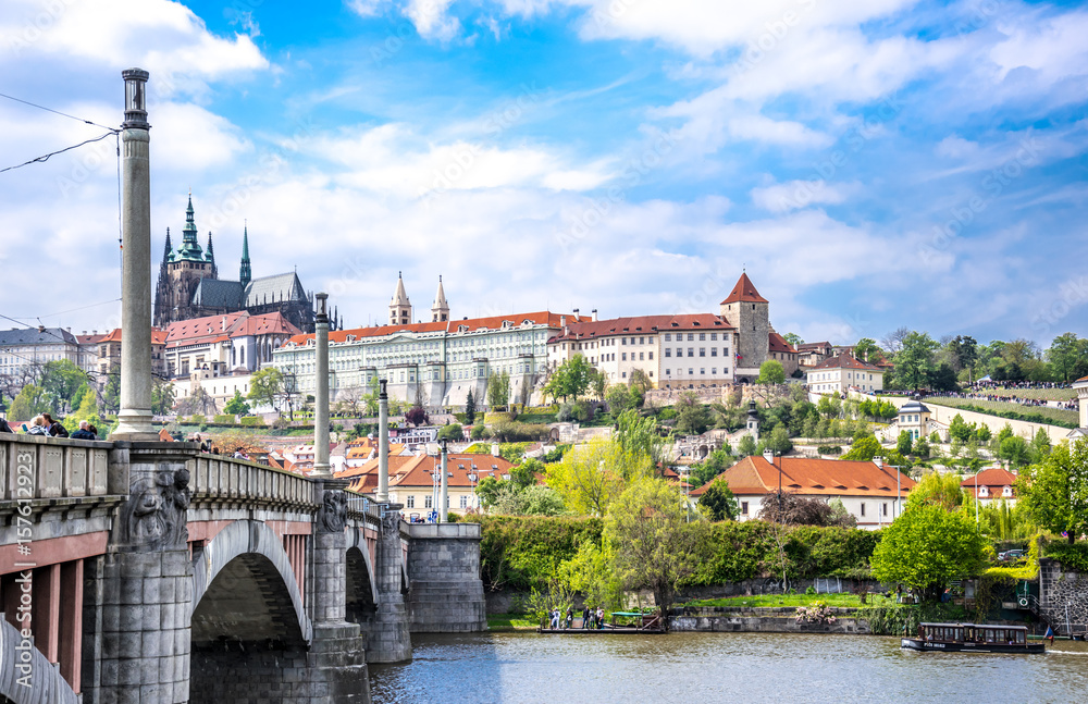 Panorama of the city of Prague. The ancient bridge over the Vltava River and the historic historic center of the city