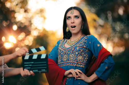 Surprised Bollywood Actress Wearing an Indian Outfit and Jewelry  photo