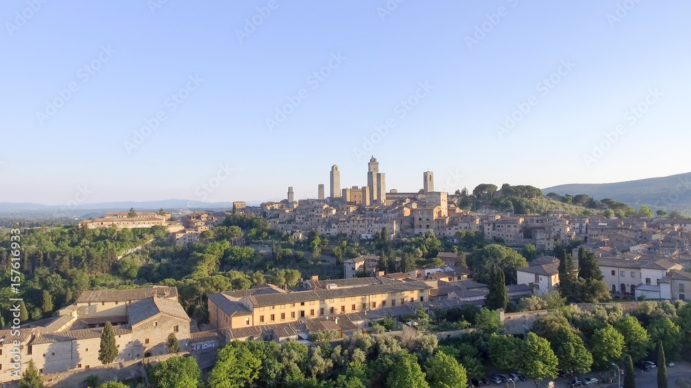 Beautiful sunset aerial view of San Gimignano, small medieval town of Tuscany - Italy