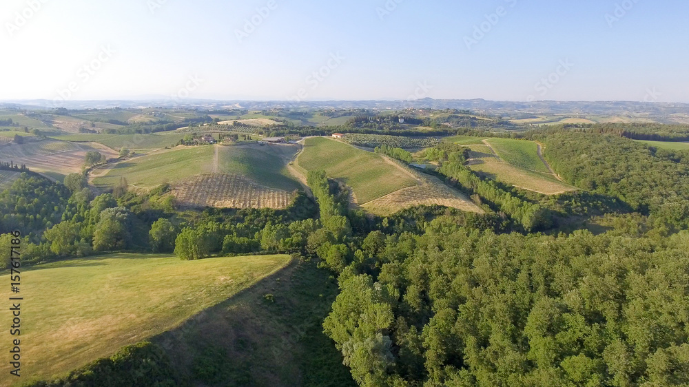 Fototapeta premium Tuscany countryside hills, stunning aerial view in spring