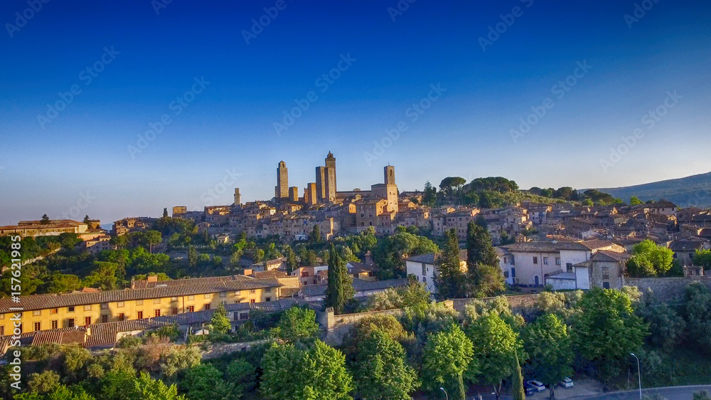 Beautiful sunset aerial view of San Gimignano, small medieval town of Tuscany - Italy