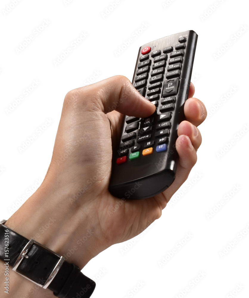 Mano sujetando un control remoto en fondo blanco. Mano sujetando un control remoto en fondo blanco.