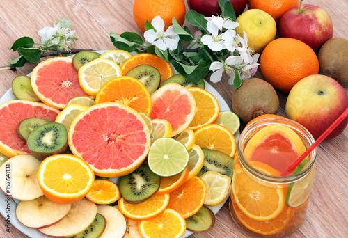 sliced grapefruit  lemons kiwi tangerines and oranges