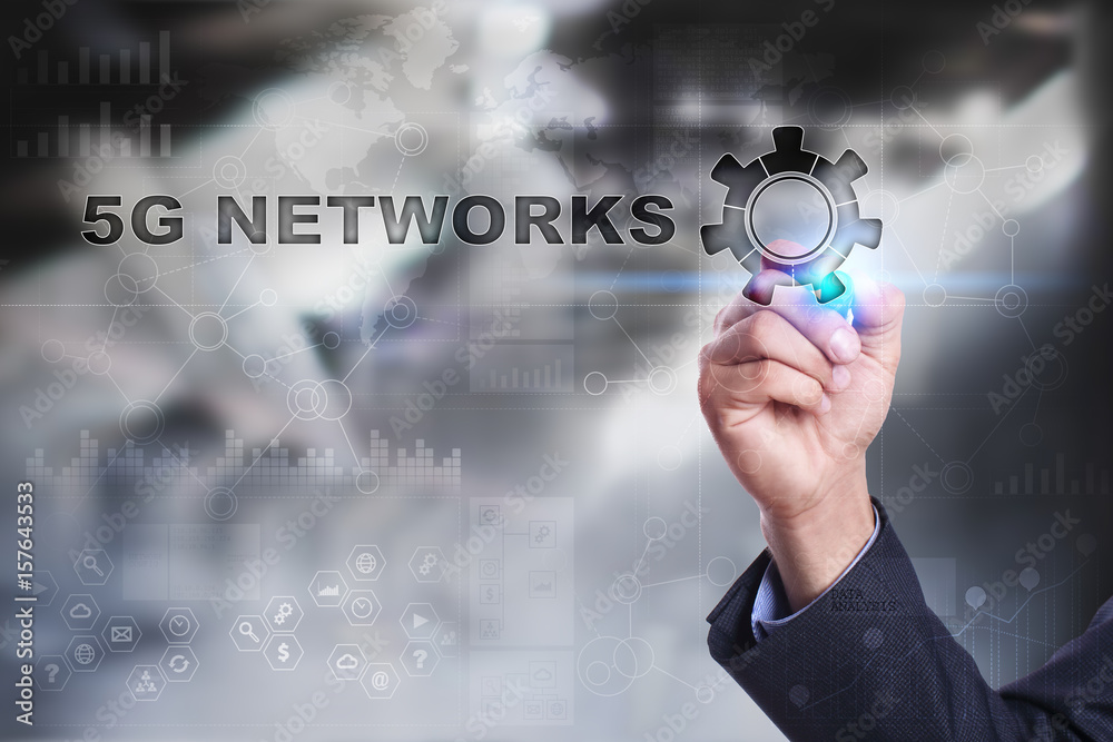 Businessman is drawing on virtual screen. 5g networks concept. Businessman is drawing on virtual screen. 5g networks concept.