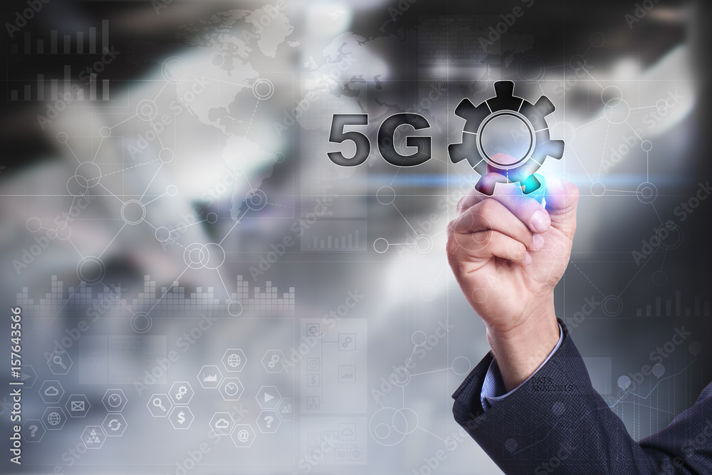 Businessman is drawing on virtual screen. 5g concept. Businessman is drawing on virtual screen. 5g concept.